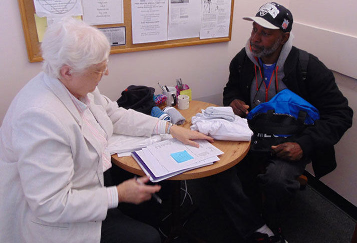 Sister Geraldine Neier meets with a client at the Criminal Justice Ministry.