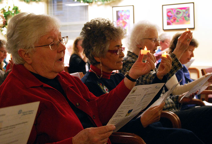 Sisters pray at the International Human Rights Day service at Notre Dame of Elm Grove. 