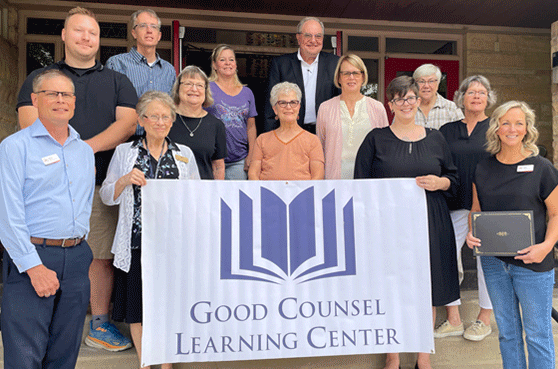 Image of The ribbon cutting at the Good Council Learning center grand opening