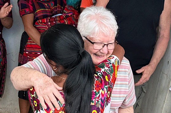 Sister Jan being thanked for water project.