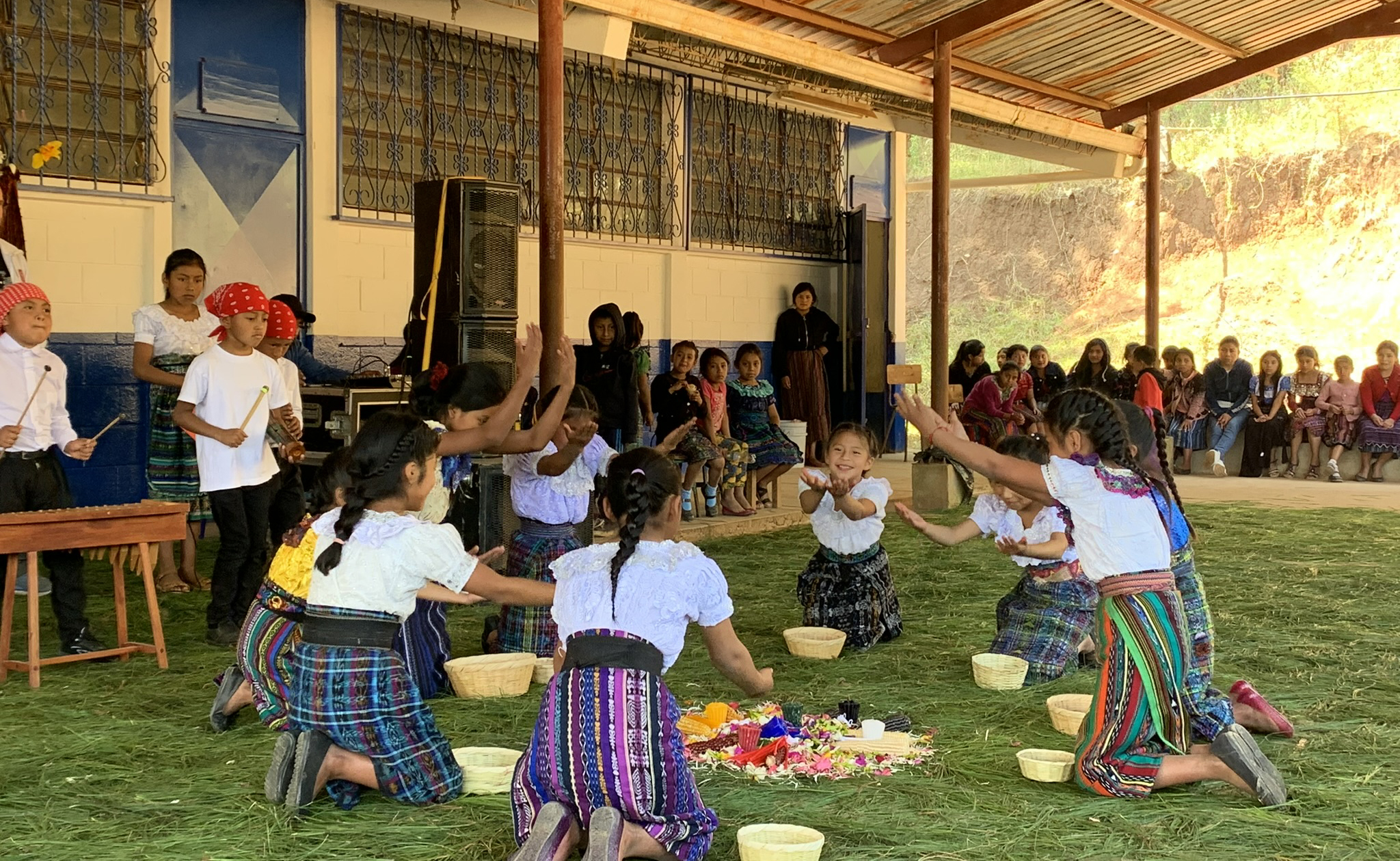 School children sharing traditional Mayan Ceremony.