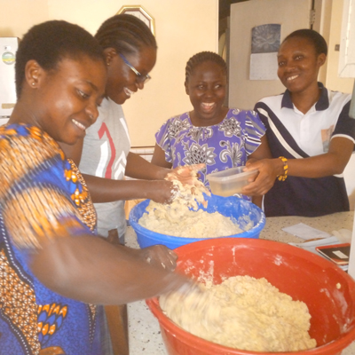 Postulants in Kenya prepare treats in advance of Christmas celebrations.  Photo provided by Sister Jeanne Goessling.