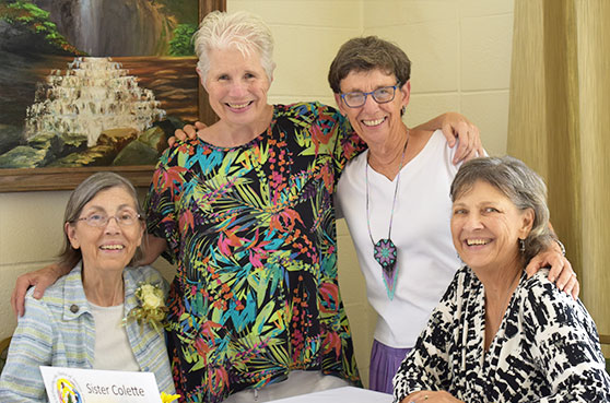 Sisters Collette Kraus and Judy Bourg along with Helen Addision and Sister Collette's sister pose for a photo at St. Mary of the Pines in Chatawa, Mississippi. 